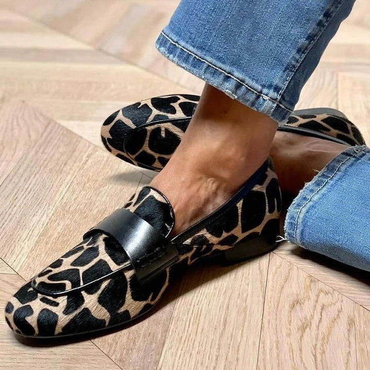 Elegant women's streamlined slip-on loafers for effortless comfort. Ideal smart casual & office wear flats with low heel.