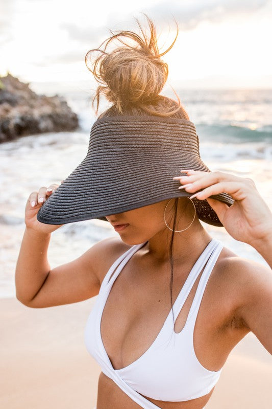 Women's foldable wide brim sun visor with an elegant bow, perfect for beach & travel.
