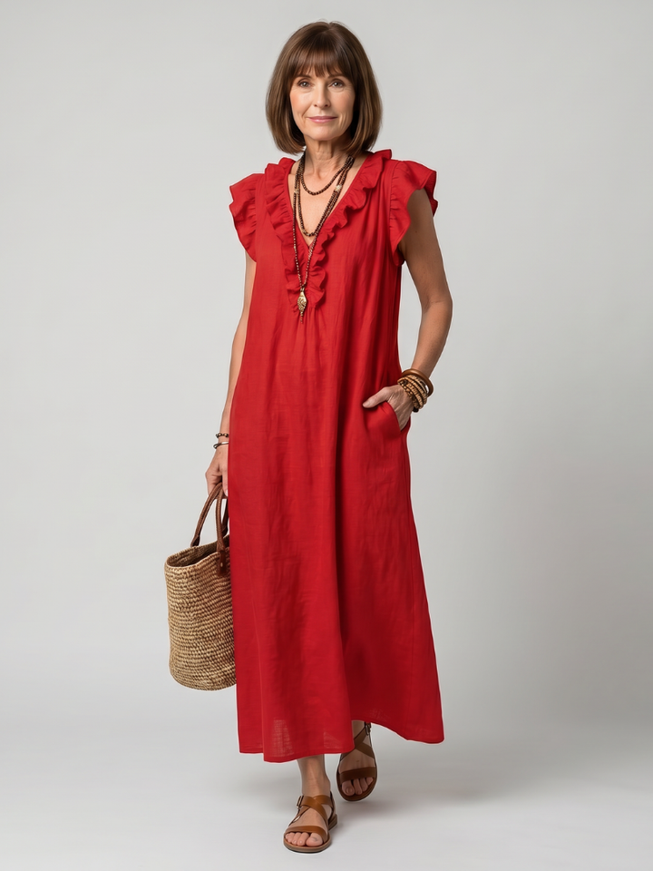 Warm weather women's sleeveless midi dress, comfortable flowing fit and elegant ruffle trim detail.