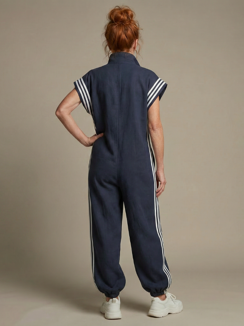 Women's high neckline jumpsuit, full length, with a zip front and fashionable stripe paneling.