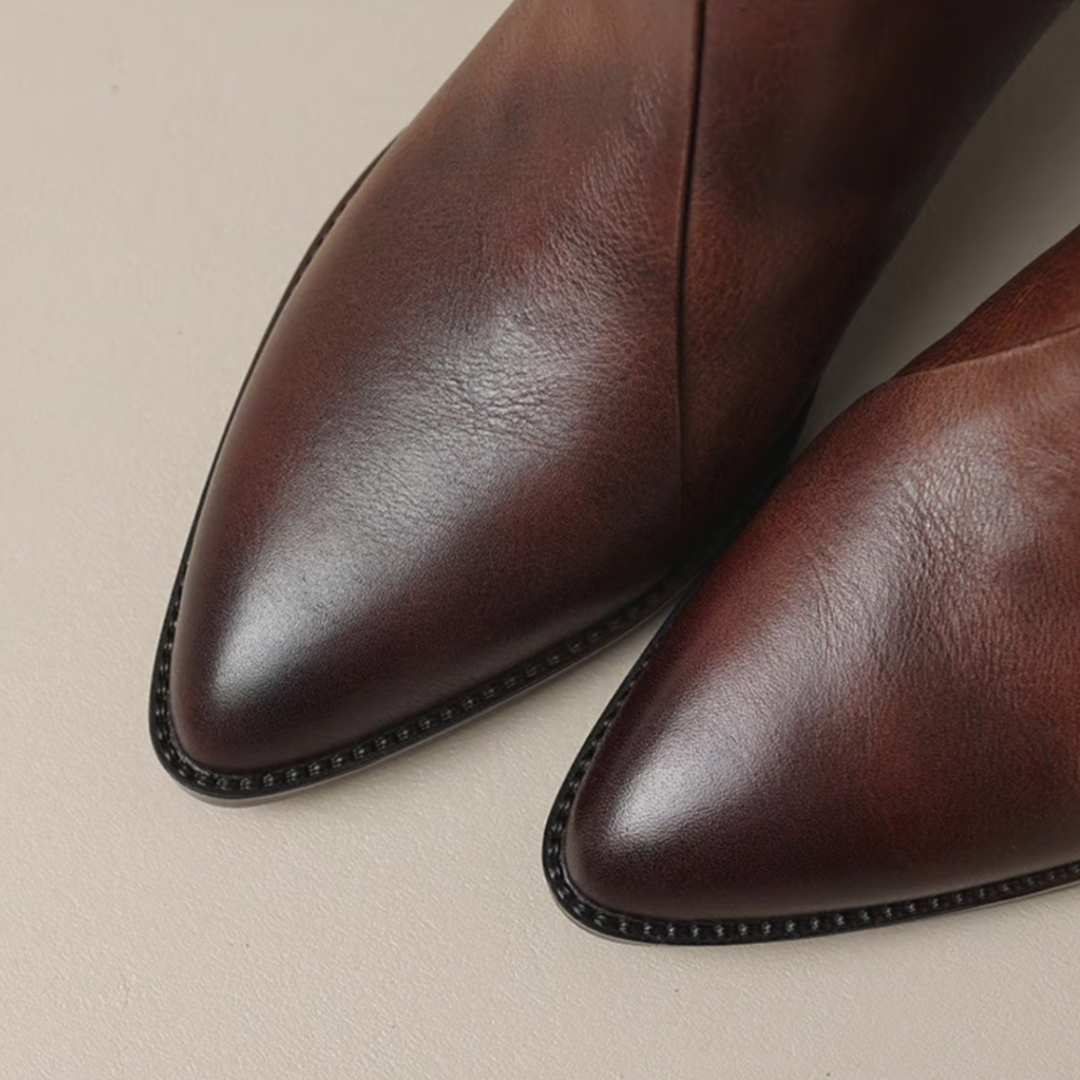 Elegant brown women's ankle boots, a comfortable and versatile choice for fall fashion.
