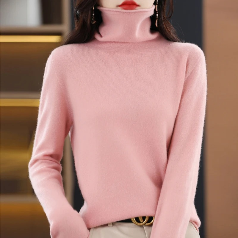 Versatile women's soft pullover. Warm roll neck sweater, perfect for any occasion.