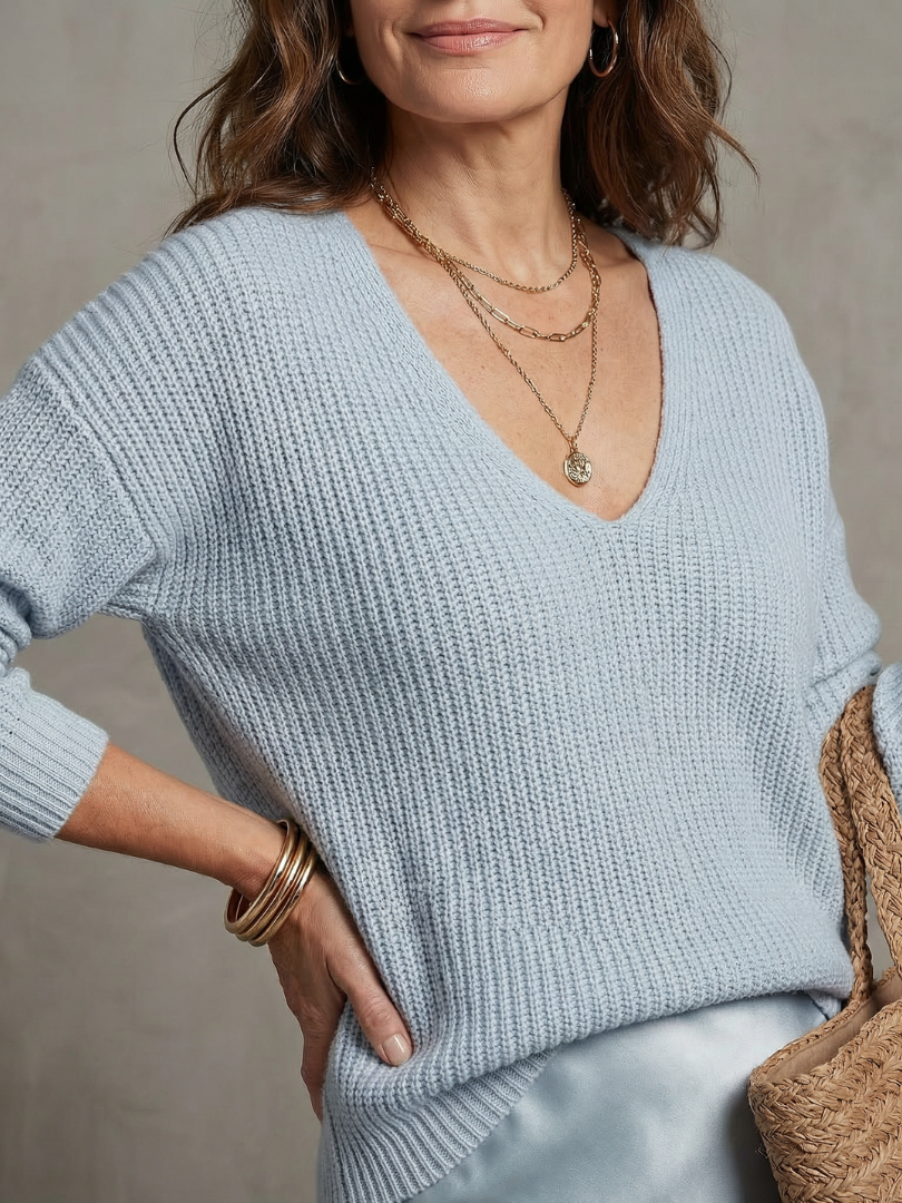 Women's elegant two-piece sweater & skirt for a chic and comfortable fall outfit. Everyday versatile wear.