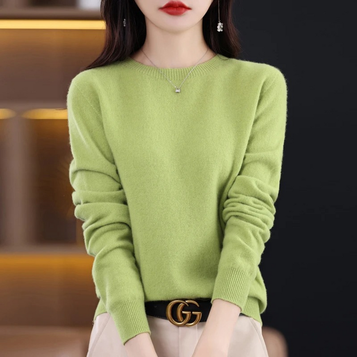 Luxury women's round neck knitwear, a soft, warm pullover ideal for elegant winter ensembles.