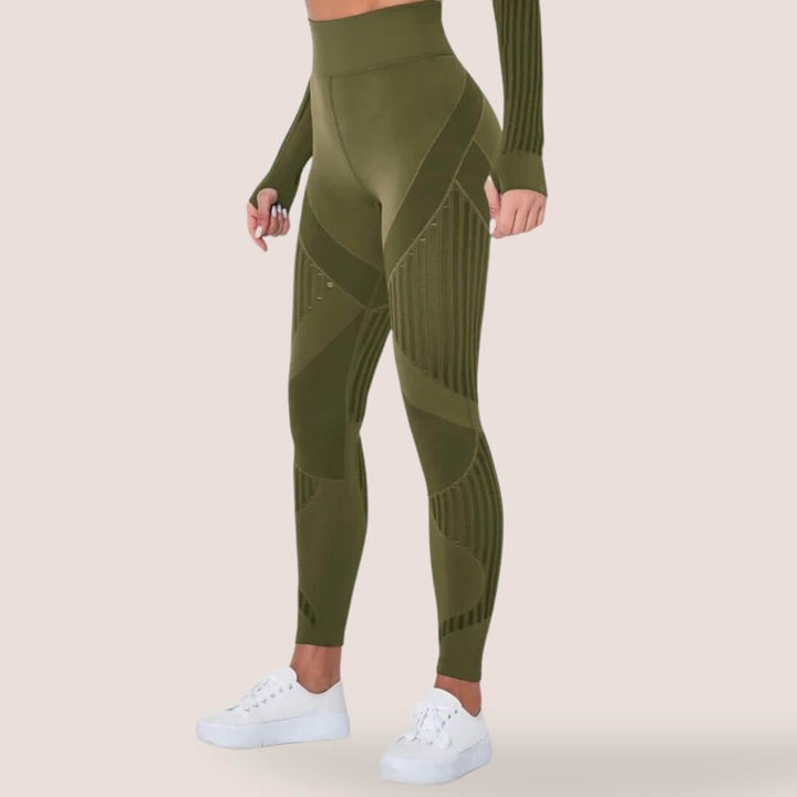 Sculpting violet slimming leggings, high-waist anti-cellulite activewear enhancing women's silhouette.