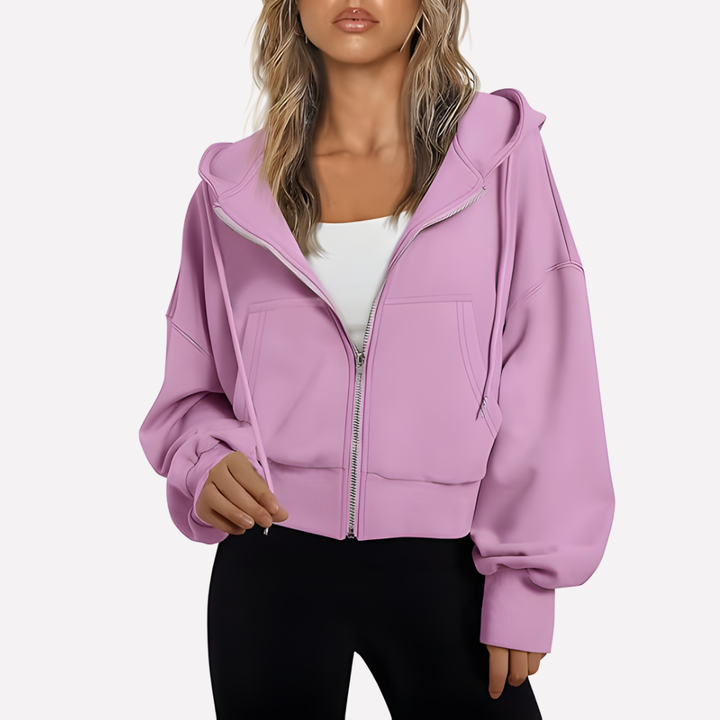 Relaxed fit women's cropped zip hoodie, essential for a stylish, casual outfit.