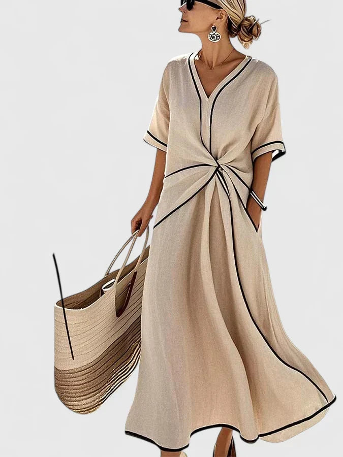 Stylish women's striped summer dress with an elegant, comfortable fit. Perfect flowy maxi for casual fashion.