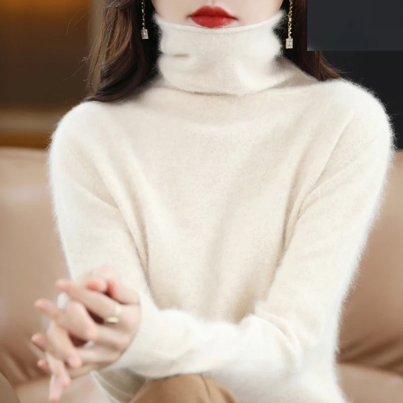 Women's luxurious turtleneck sweater, warm long sleeve pullover for elegant winter style.