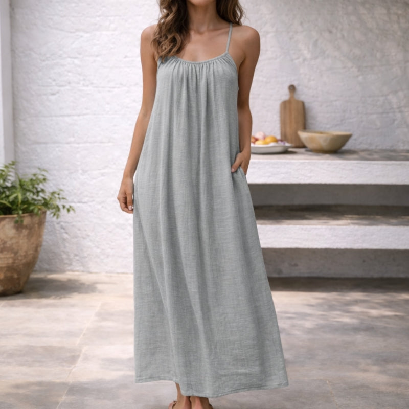 Beautiful women's maxi sundress, flowy design, perfect for warm weather and vacation fashion.