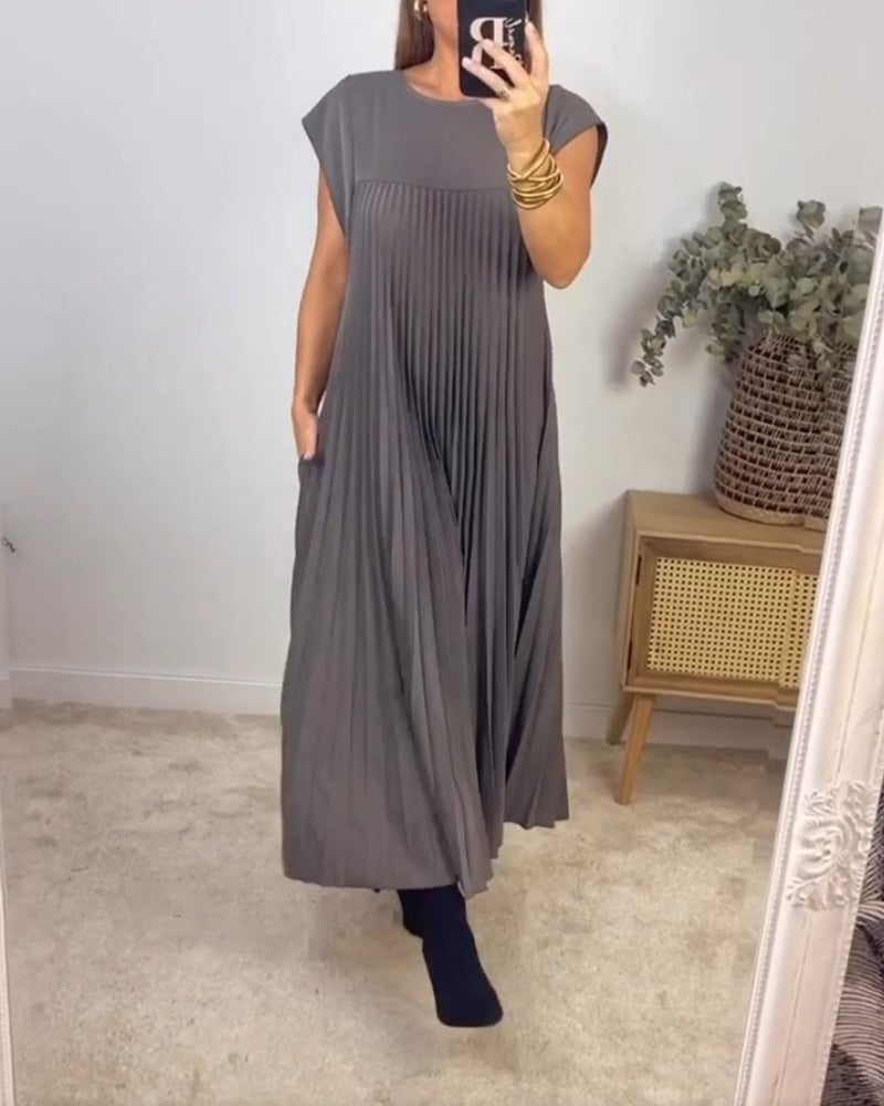 Everyday elegant pleated dress for women. Timeless comfort and versatile style options.