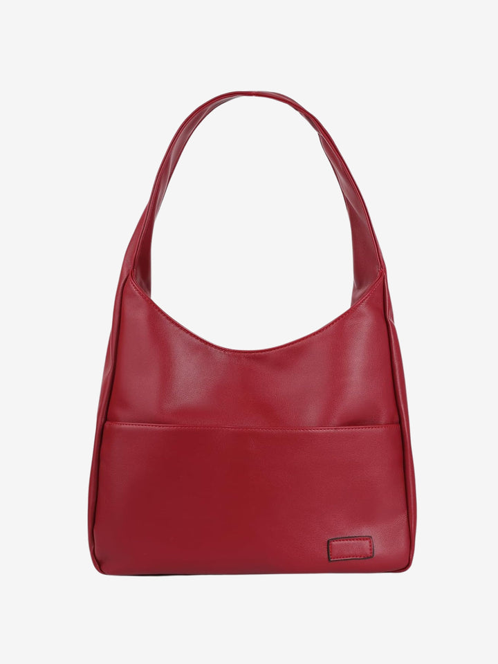 Durable women's vegan leather everyday shoulder bag. Reliable and chic for work, school, and daily commutes.