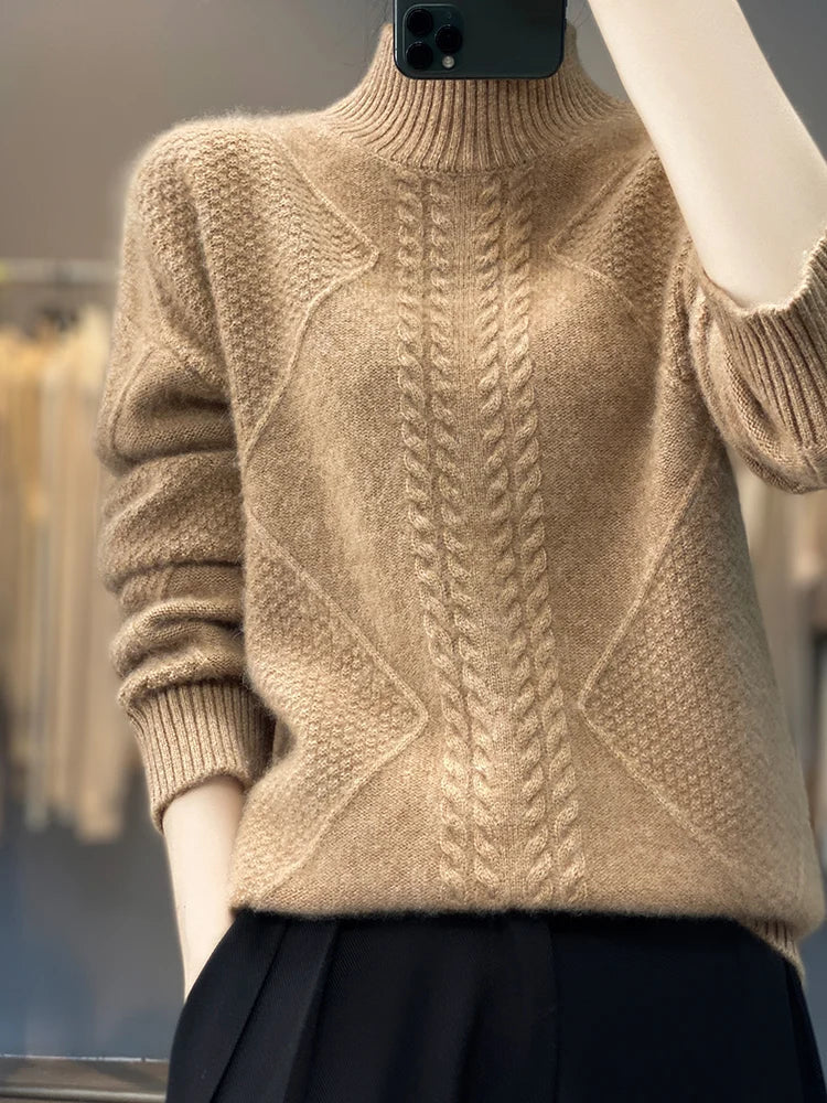 Cozy women's cashmere roll neck jumper in a warm cable knit, perfect for cold weather comfort.