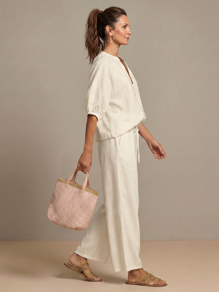Women's fashion set: zip front blouson top & wide leg pants. A versatile casual chic ensemble.