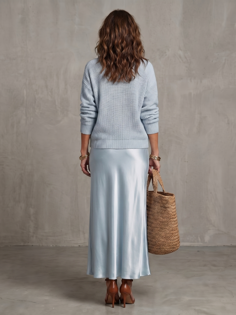 Fall fashion elegant women's two-piece set: long sleeve sweater & midi skirt. Comfortable & stylish.