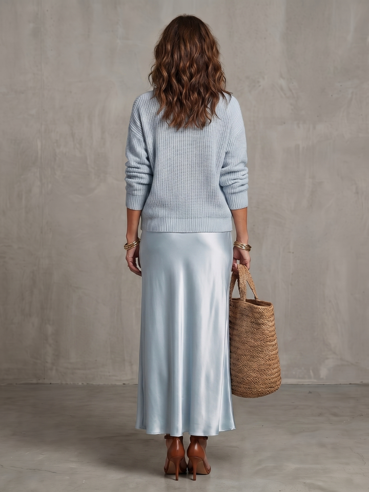 Fall fashion elegant women's two-piece set: long sleeve sweater & midi skirt. Comfortable & stylish.