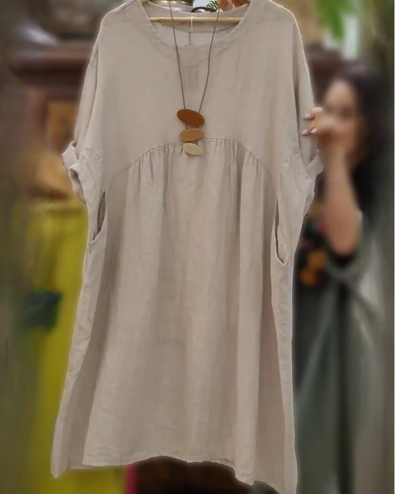 Modest and versatile women's summer dress with a flowy, wide fit, ensuring comfort and flattering coverage.