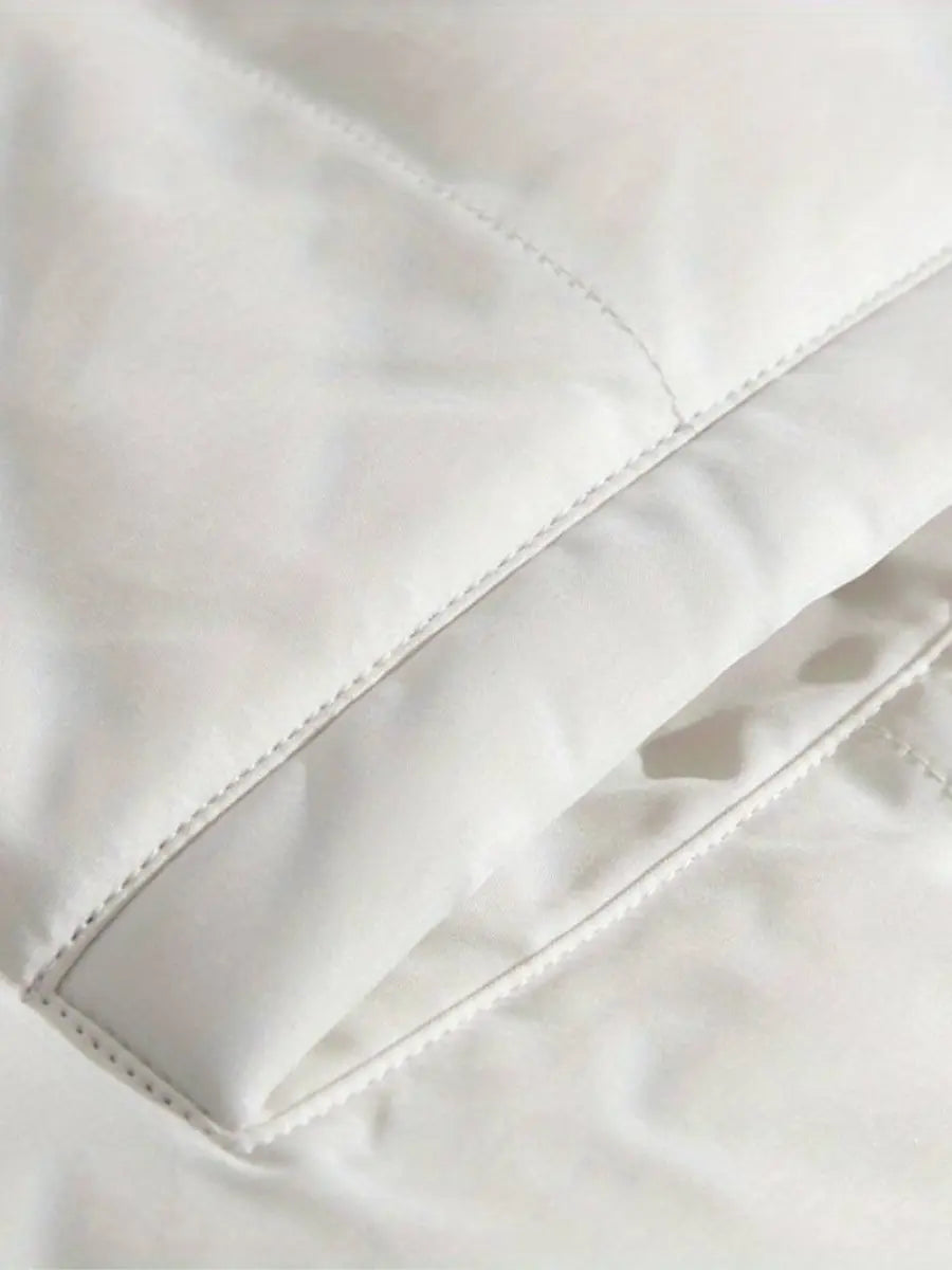 White women's luxury puffer jacket, a warm hooded winter coat with an elegant plush collar.