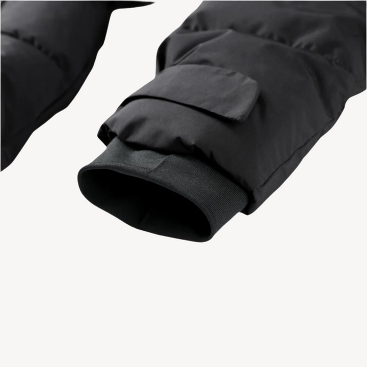 Warm women's black puffer jacket with belt, stylish quilted design, perfect winter coat for cold weather fashion.