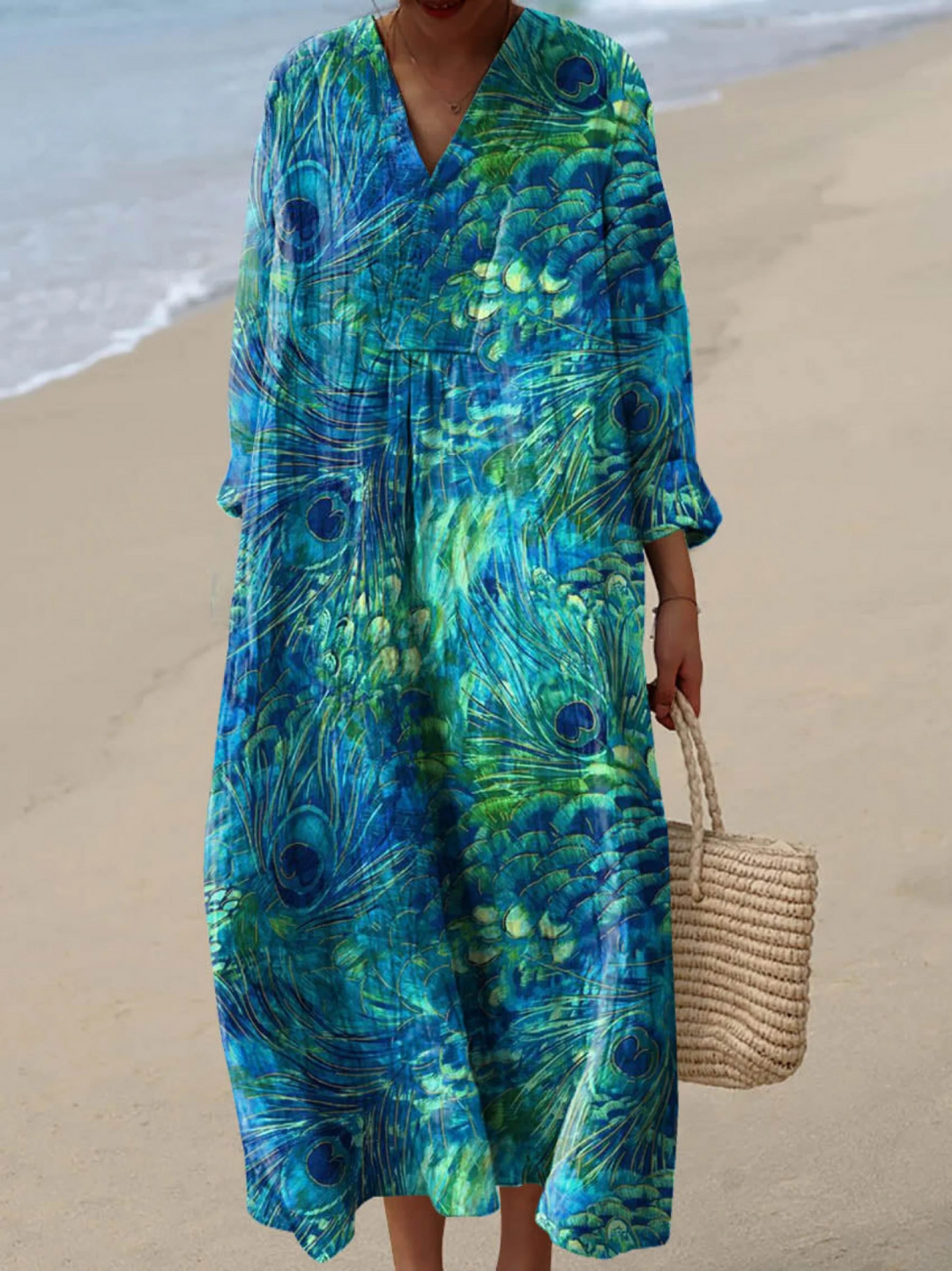 Elegant Women's long sleeve dress with vibrant peacock feather print, ideal for flowing spring fashion.