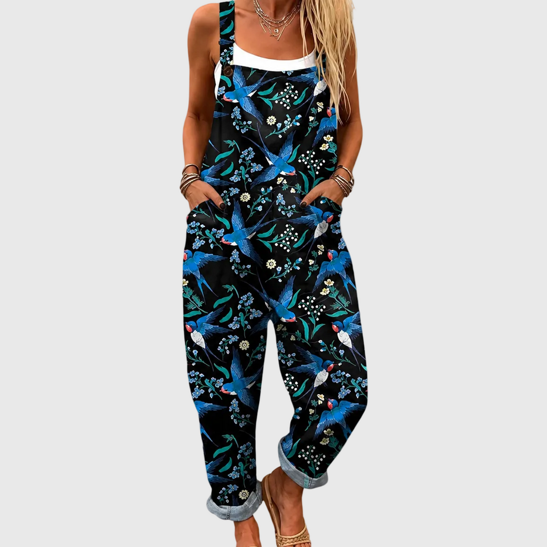 Elegant black women's swallow print relaxed fit overalls jumpsuit. Perfect casual fashion for spring & summer style.