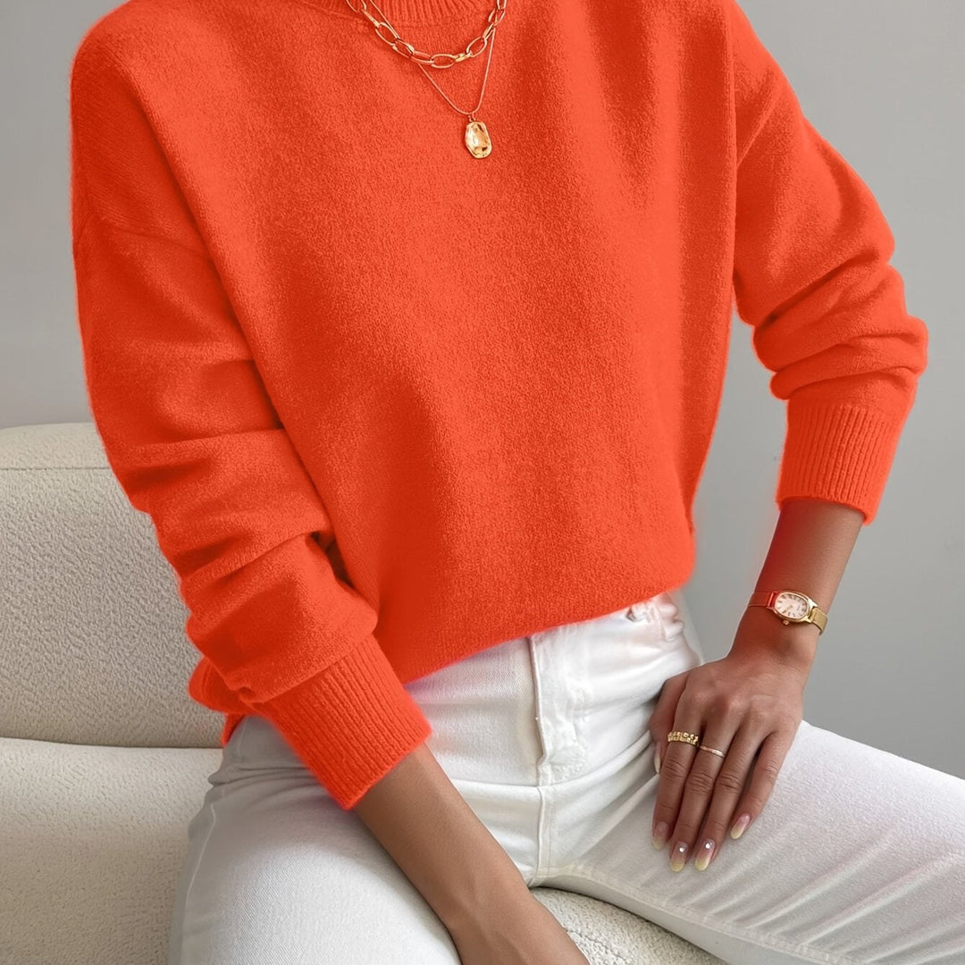 Warm long sleeve high neck knitted jumper, staple for winter wardrobes.