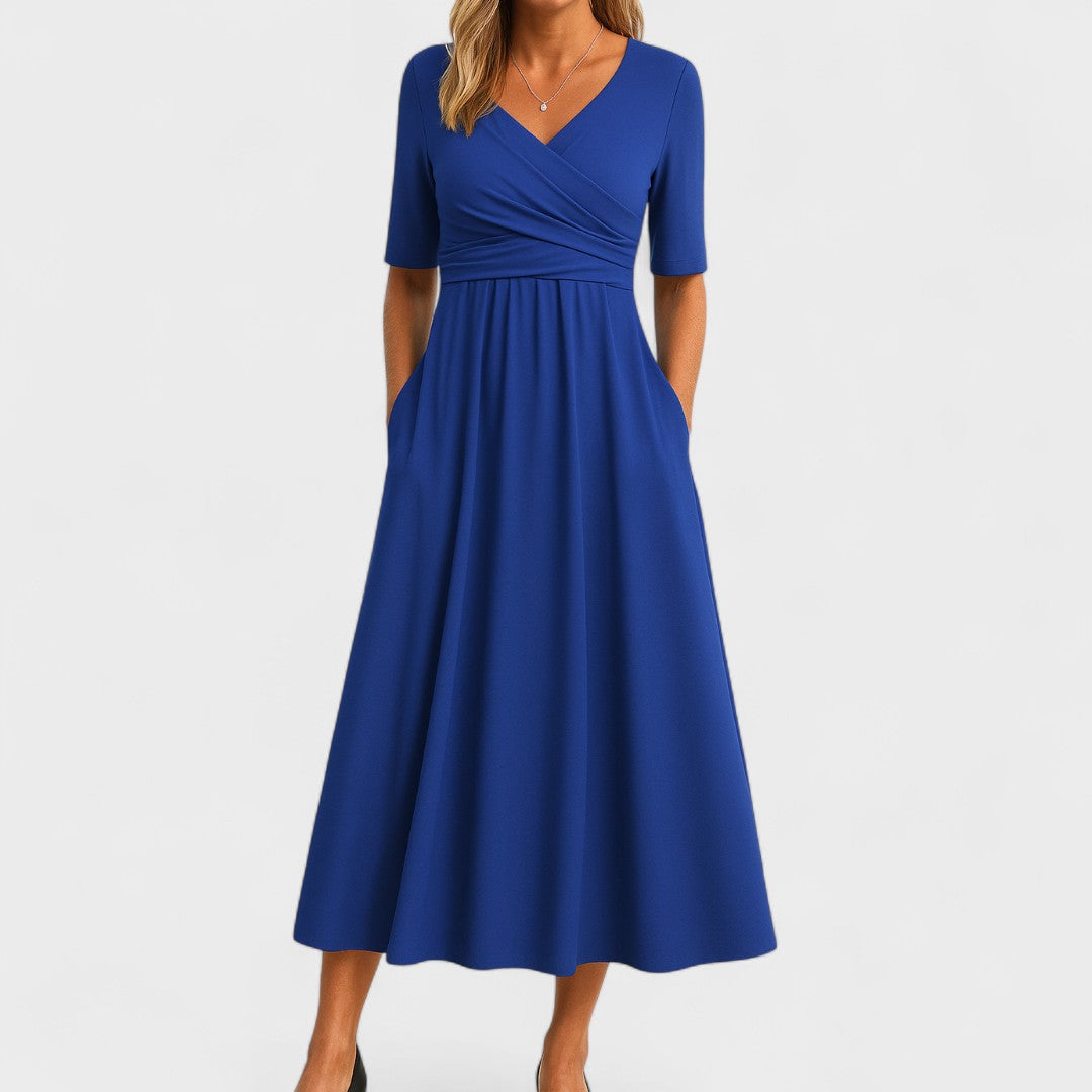 Black V-neck midi dress for women, a versatile and elegant choice for work or casual weekend wear.
