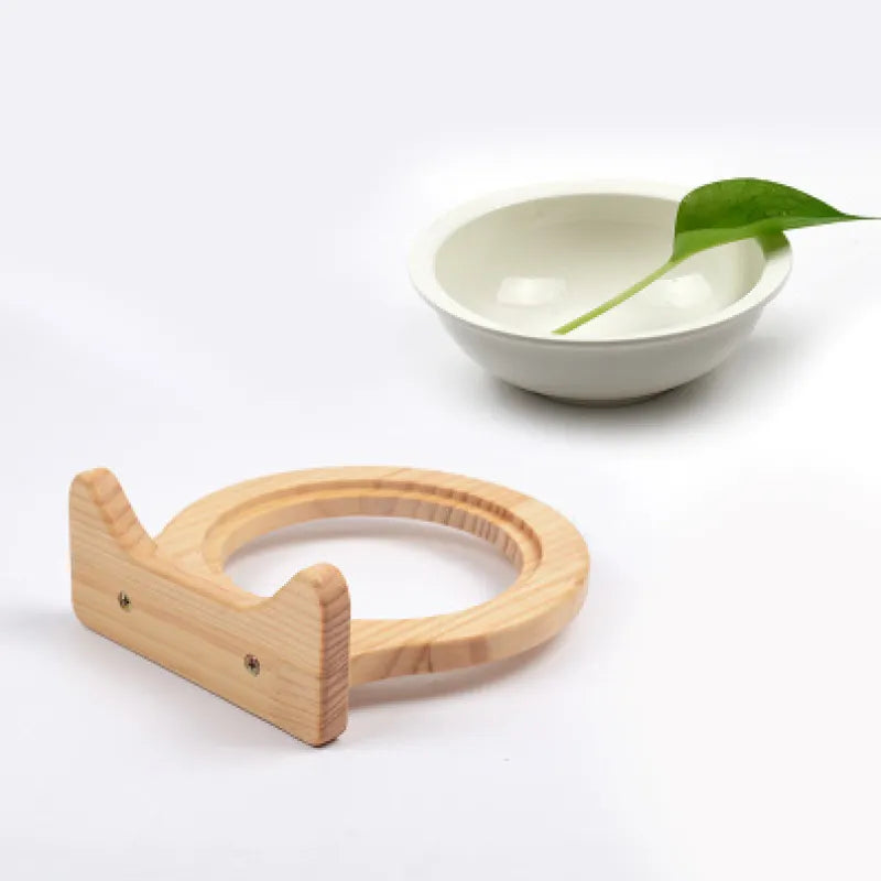 Elegant wall-mounted cat bowl features a cloud design wooden frame. Elevated feeder promotes healthy posture.