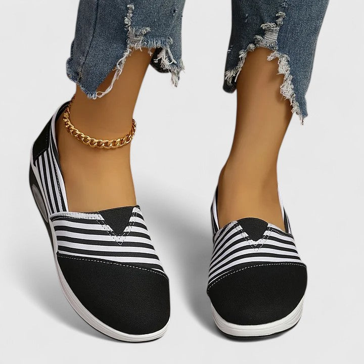 Lightweight women's walking shoes, offering superior orthopedic comfort and foot support.
