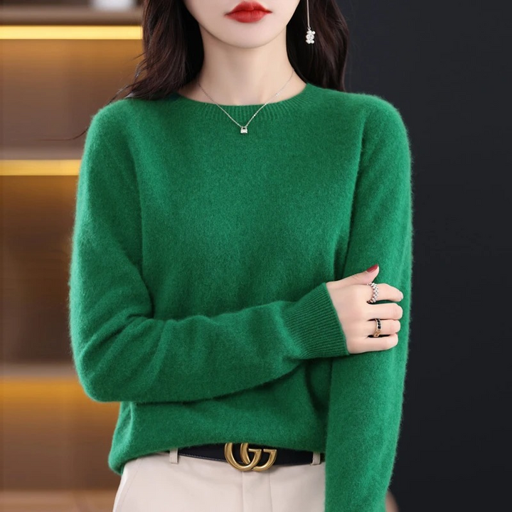Warm women's long sleeve sweater, a luxury round neck pullover perfect for elegant winter style.