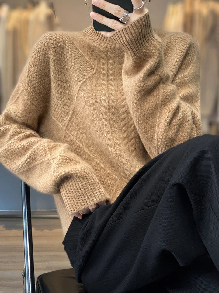 Elegant women's cashmere roll neck jumper, soft knit design, ideal for sophisticated winter outfits.