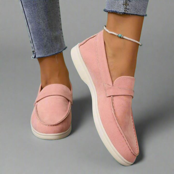 Classic women's slip-on moccasins, comfortable walking shoes for ladies' everyday style.