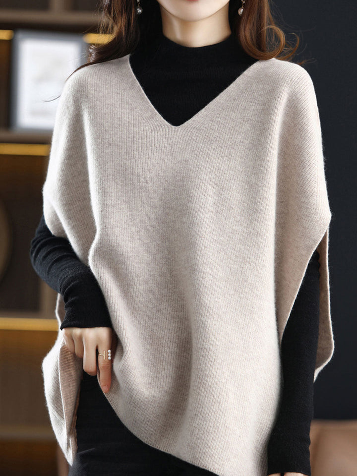 Soft knit V-neck vest for women, a chic solid color layering piece for autumn and spring style.