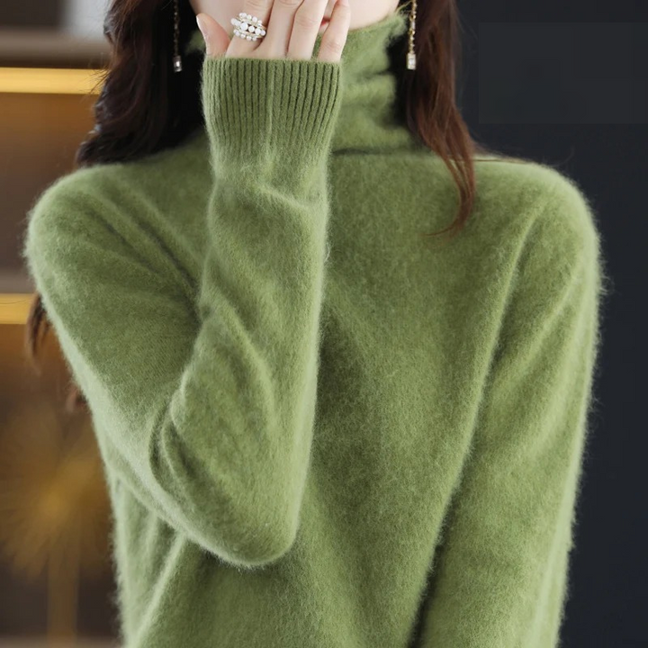 Cozy ladies' turtleneck pullover, soft knit for autumn fashion & comfortable wear.