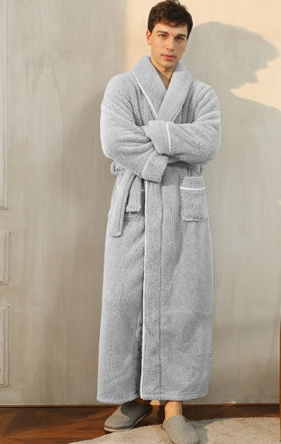 Model in cozy unisex thick plush over-knee bathrobe, showing comfortable fit & ultimate winter comfort.
