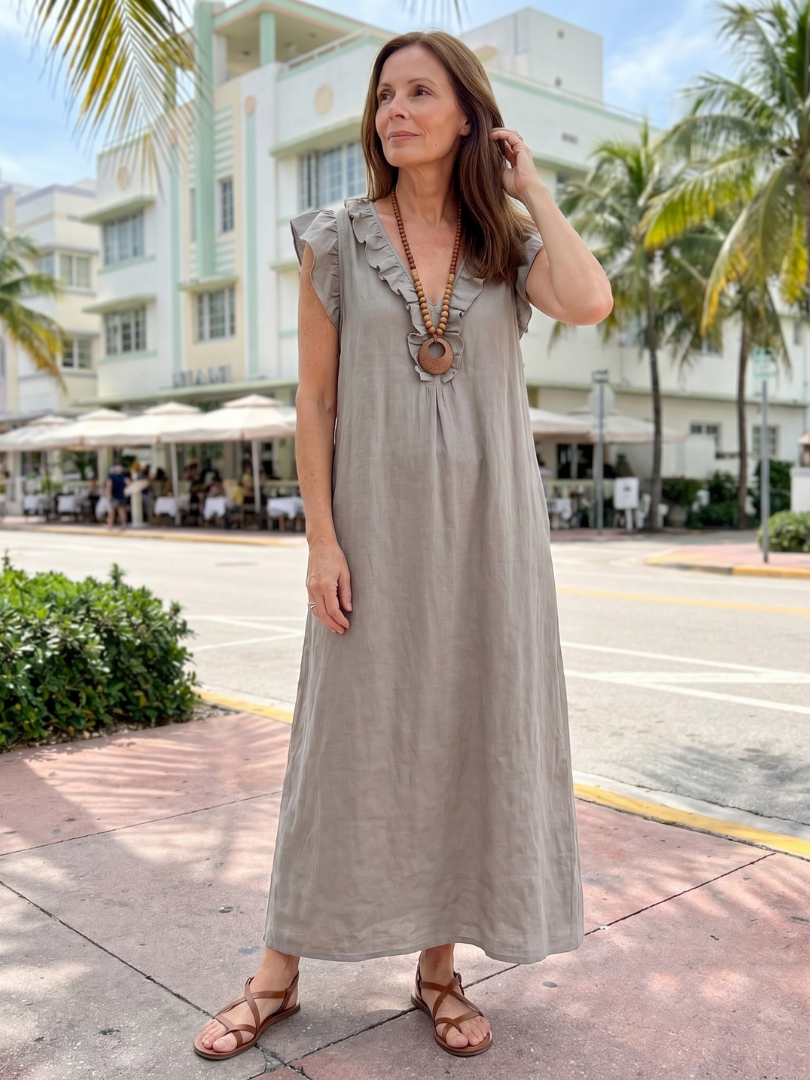 Casual women's sleeveless midi dress, ruffle trim, V-neck, designed for effortless comfort.