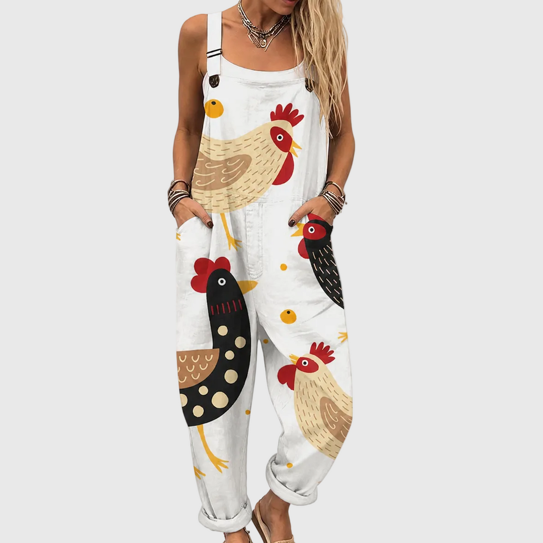 Women's rustic rooster print comfort jumpsuit, loose fit, adjustable straps, pockets. Ideal for casual summer wear.