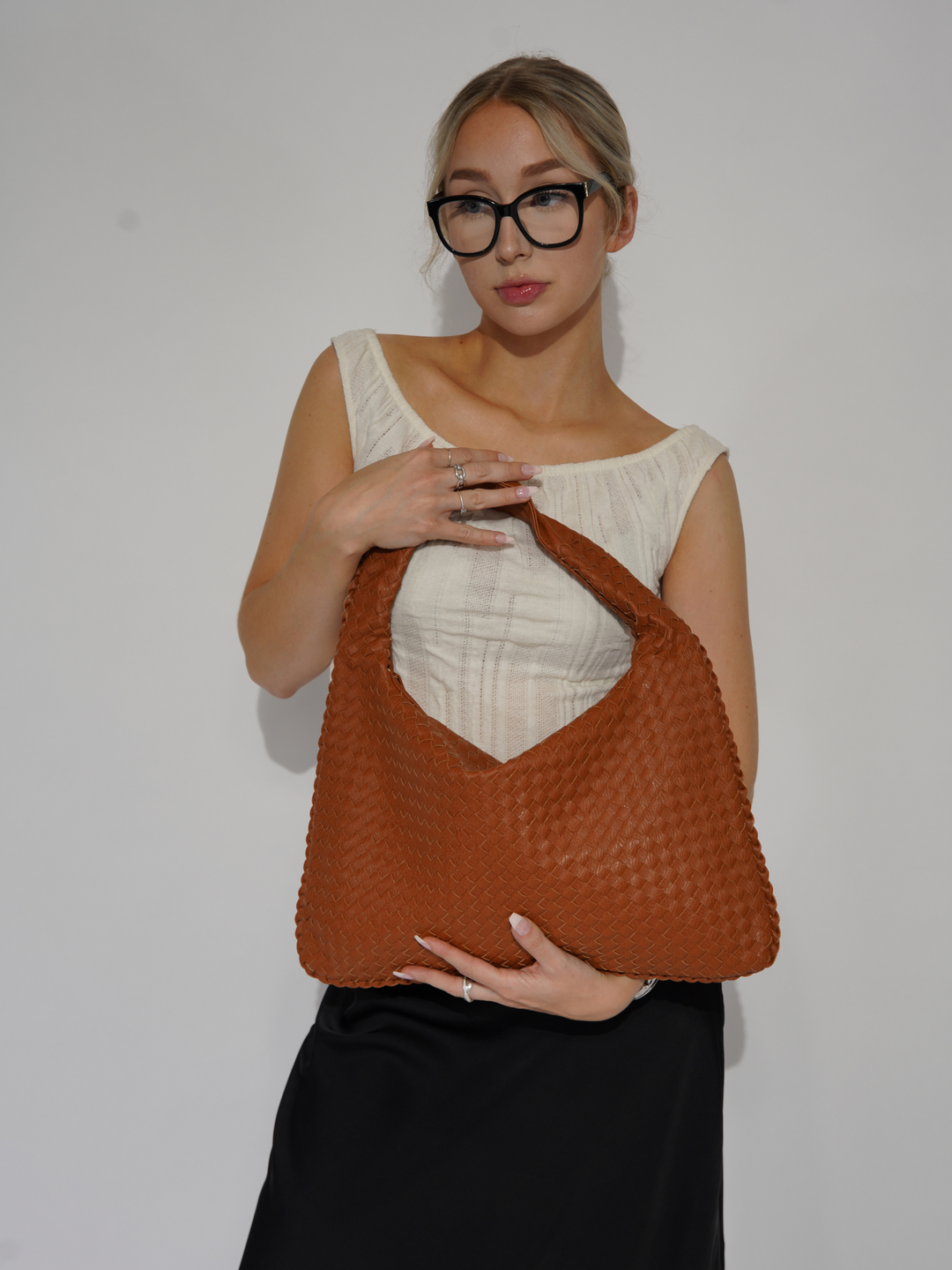 Chic women's fashion crossbody. Vegan leather one shoulder handbag for daily style.