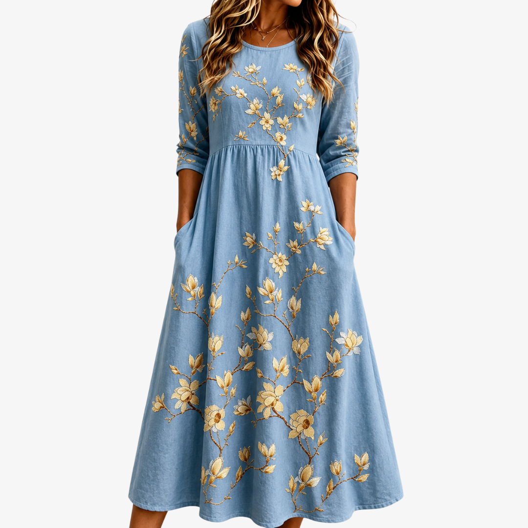 Women's Bluebell Meadow floral print midi dress with pockets. Flowy, comfortable, and casual summer style.