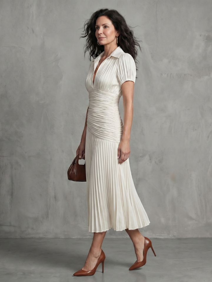 Women's elegant stripe midi dress, perfect for summer, with pleated waistline.