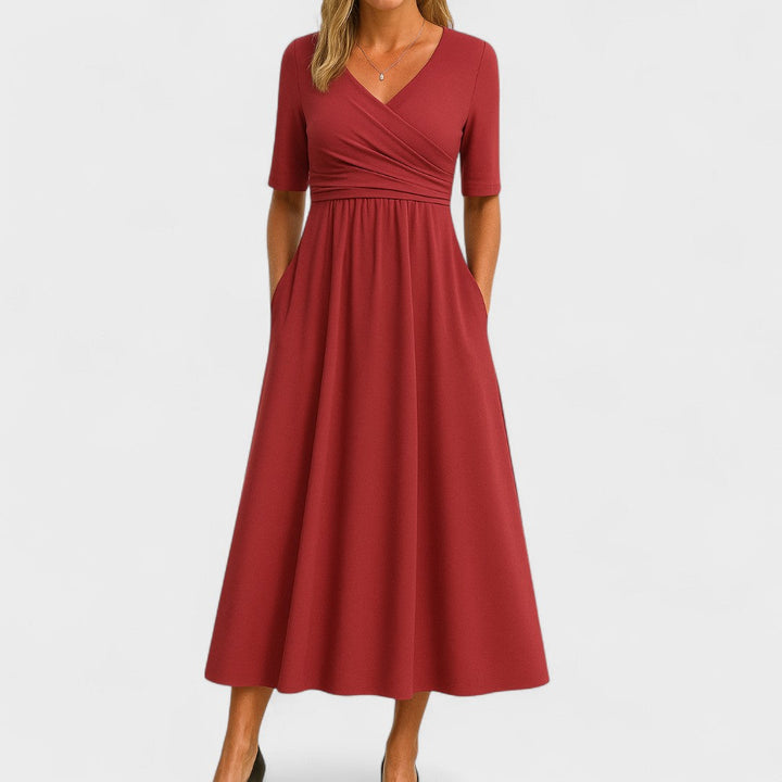 Versatile women's elbow sleeve V-neck midi dress with practical pockets, great for any occasion.