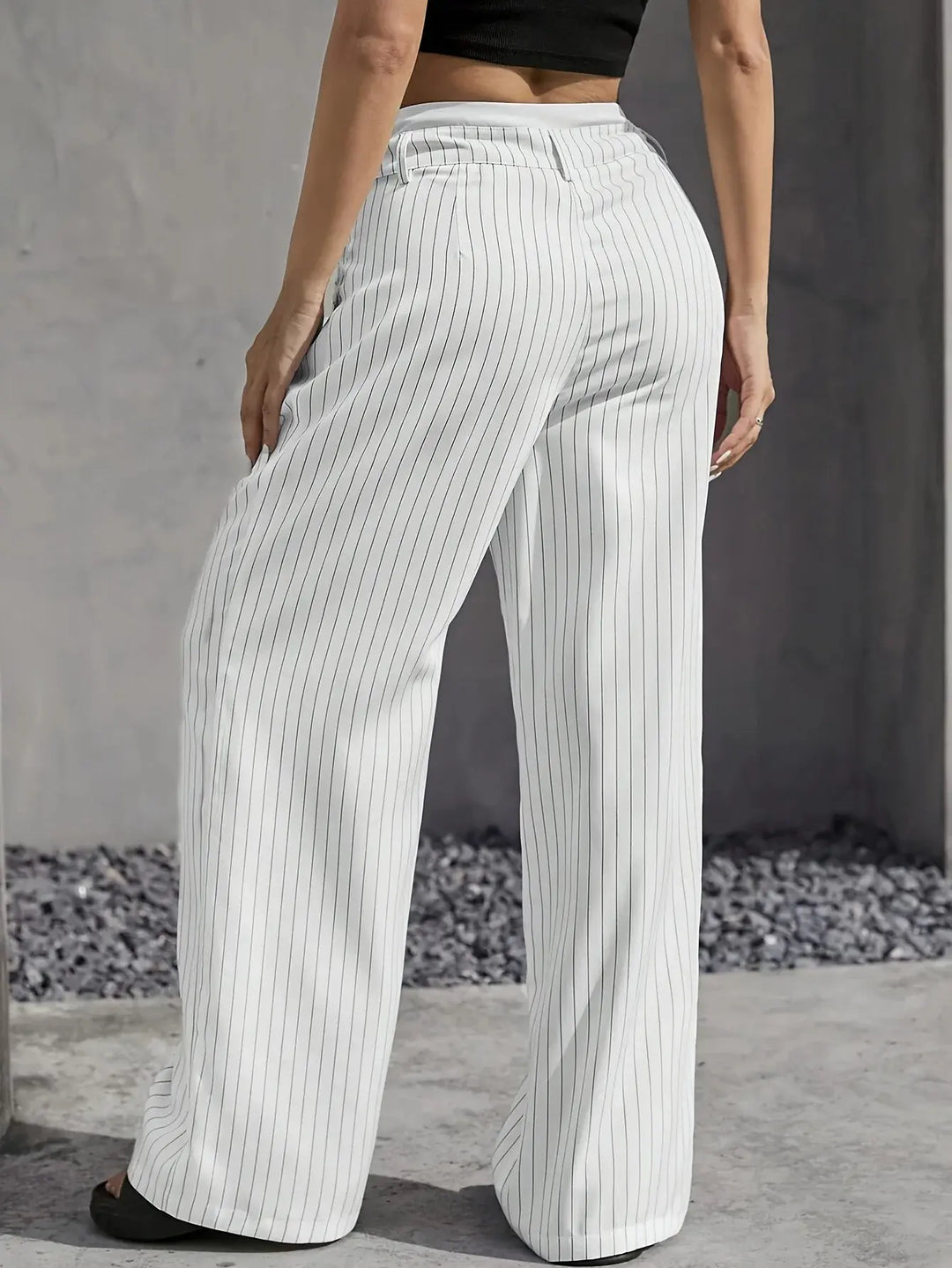 Elegant striped wide leg pants, high-waisted for a flattering, relaxed fit.