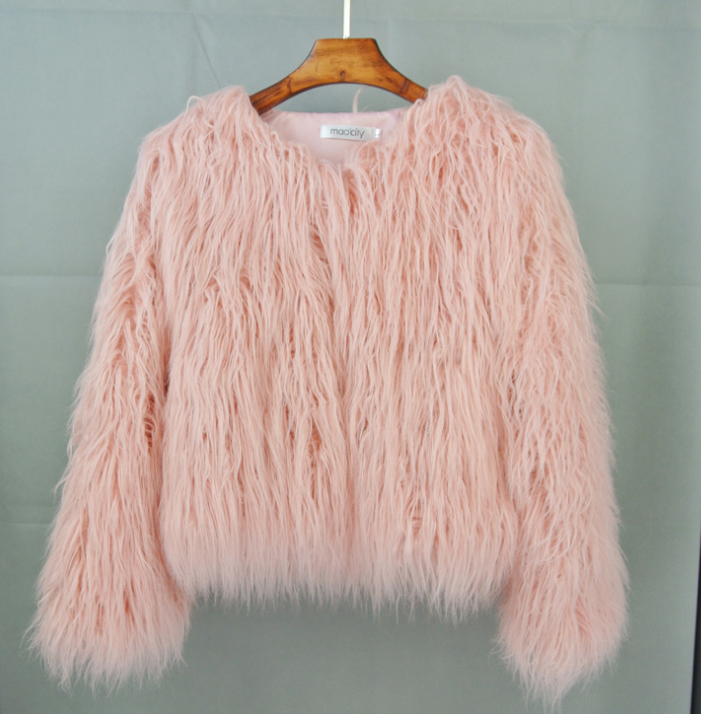 Elegant women's vibrant fluffy jacket. Short, cozy outerwear to elevate your fashion statement.