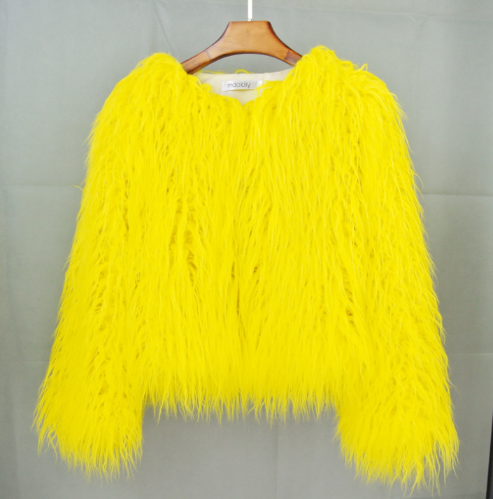 Modern women's cozy fluffy short jacket. A vibrant statement piece, perfect for stylish autumn outerwear.