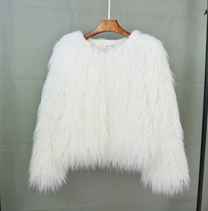 Ultra-soft women's fluffy short jacket, providing cozy warmth. A vibrant & casual winter fashion piece.
