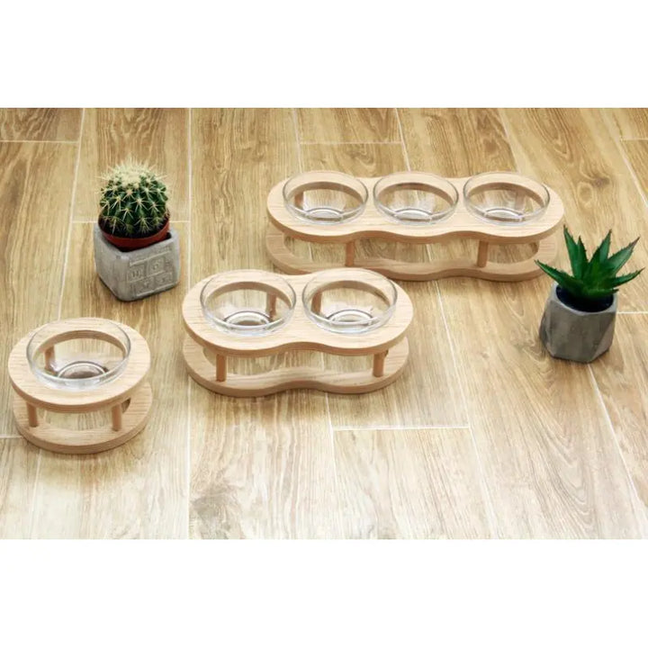 Stylish elevated wooden stand with two dishwasher-safe glass pet bowls for comfortable, mess-free feeding.