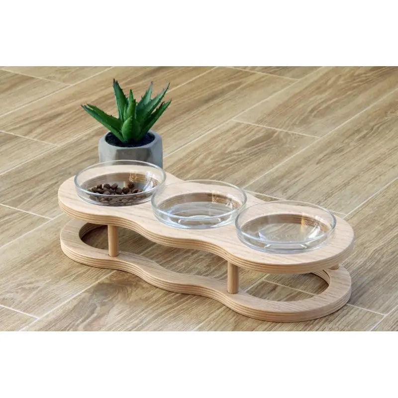 Premium pet elevated feeder with wooden stand & two clear glass bowls. Perfect raised dog & cat food solution.