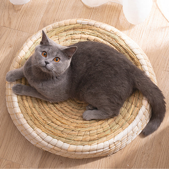Hand-woven natural cat nest pet bed for cozy feline sleep. Round, durable, and eco-friendly comfort.