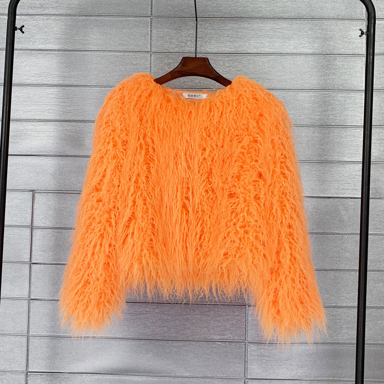 Soft fluffy short jacket for women, offering cozy warmth & a stylish casual vibe. Winter essential.