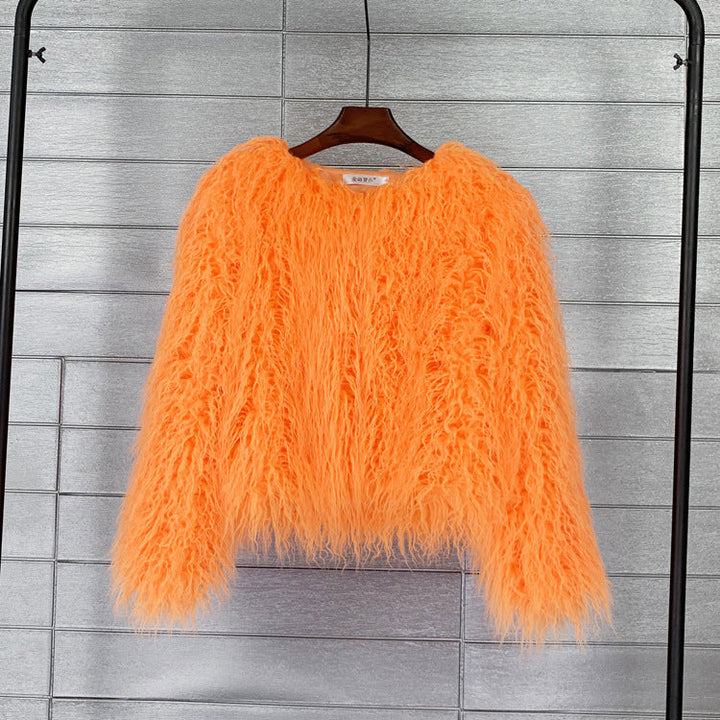 Soft fluffy short jacket for women, offering cozy warmth & a stylish casual vibe. Winter essential.