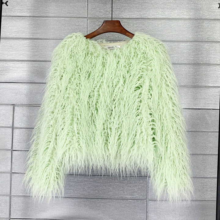 Fashionable women's cozy short jacket with a fluffy texture. Perfect for a chic autumn look.